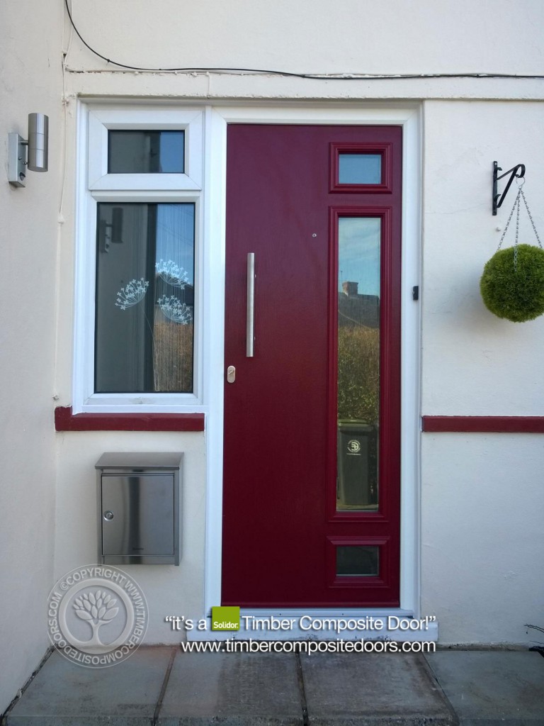 Red-Rimini-Solidor-Timber-Composite-Door | Timber Composite Doors Part of the Contemporary Italia collection, the Solidor Rimini composite door delivers a sleek, artistic edge with its distinctive offset glazed panels and asymmetric minimalist design