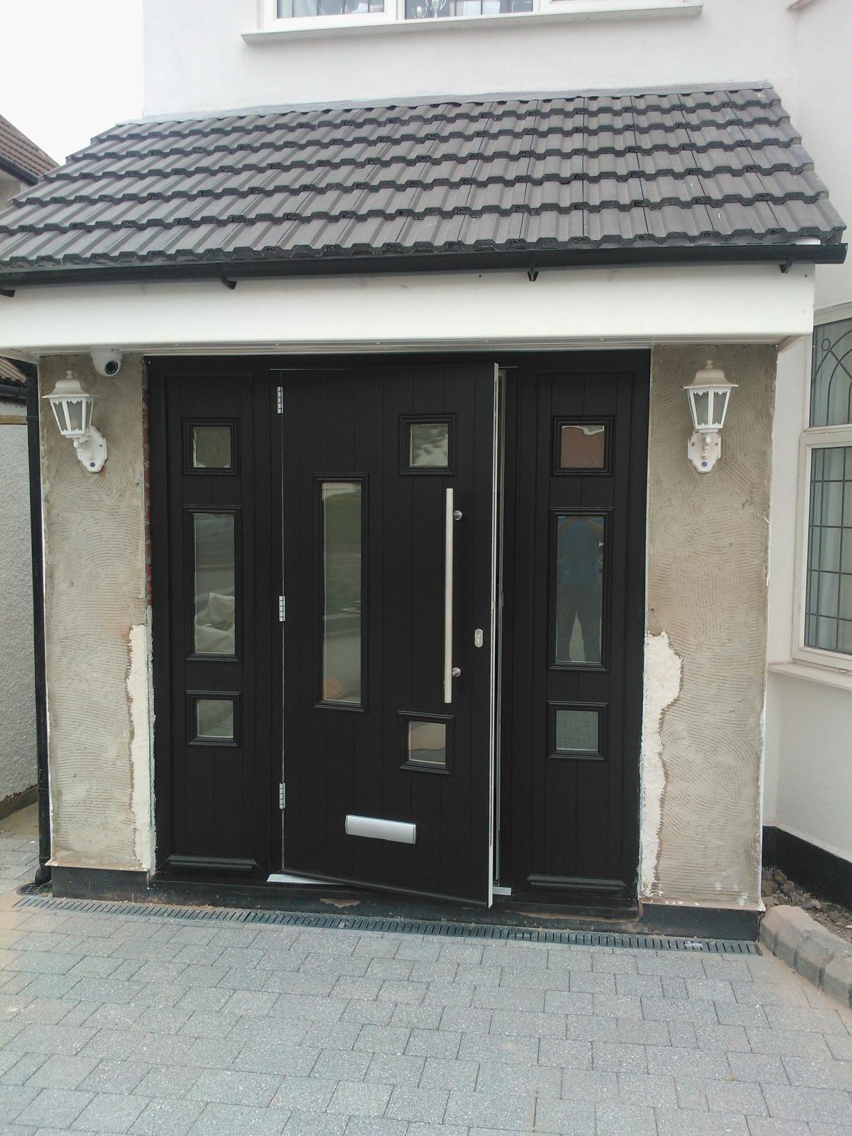 Solidor Messina composite door with a long bar handle for a clean, high-end entrance look.