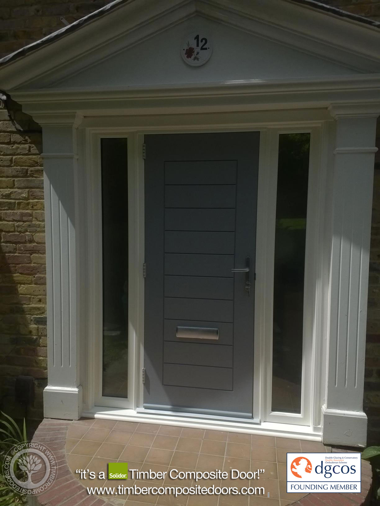 Solidor Windsor composite door in Deep Merlot with refined panelled design and minimalist glazing, creating a prestigious, traditional UK entrance.