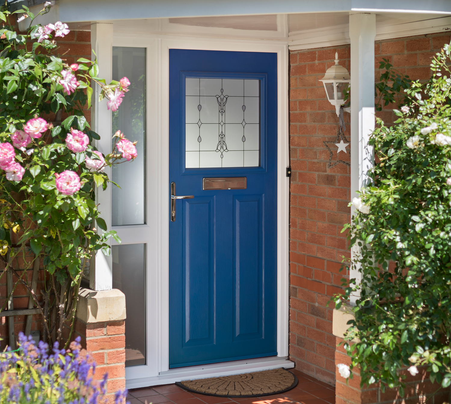 Solidor composite doors shown as part of a wider comparison with aluminium doors, highlighting construction style and overall finish
