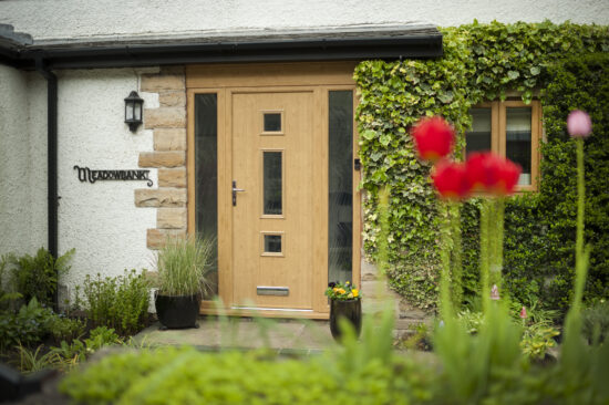 A modern front door upgrade showing how design, security, and kerb appeal answer the question: does a new front door add value?
